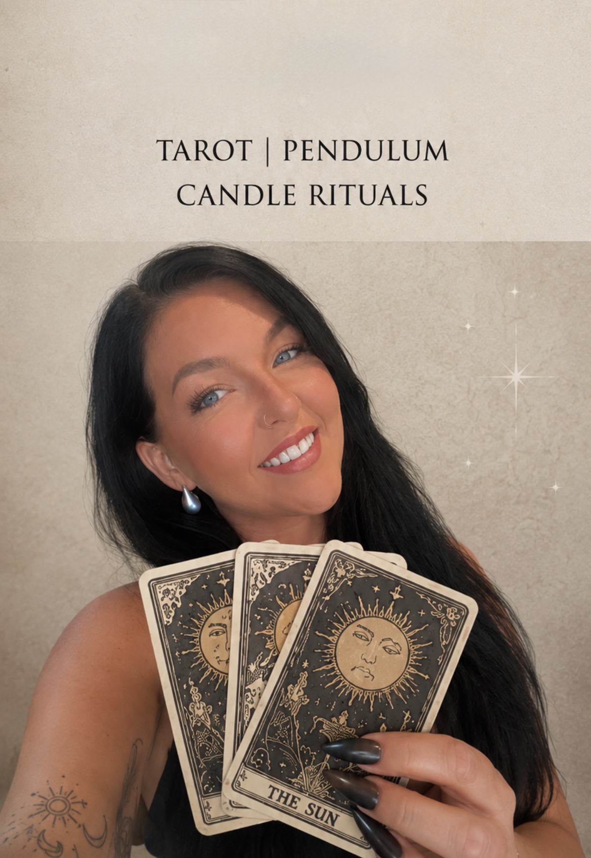 Chelsie, owner of The Divine Room, holding tarot cards